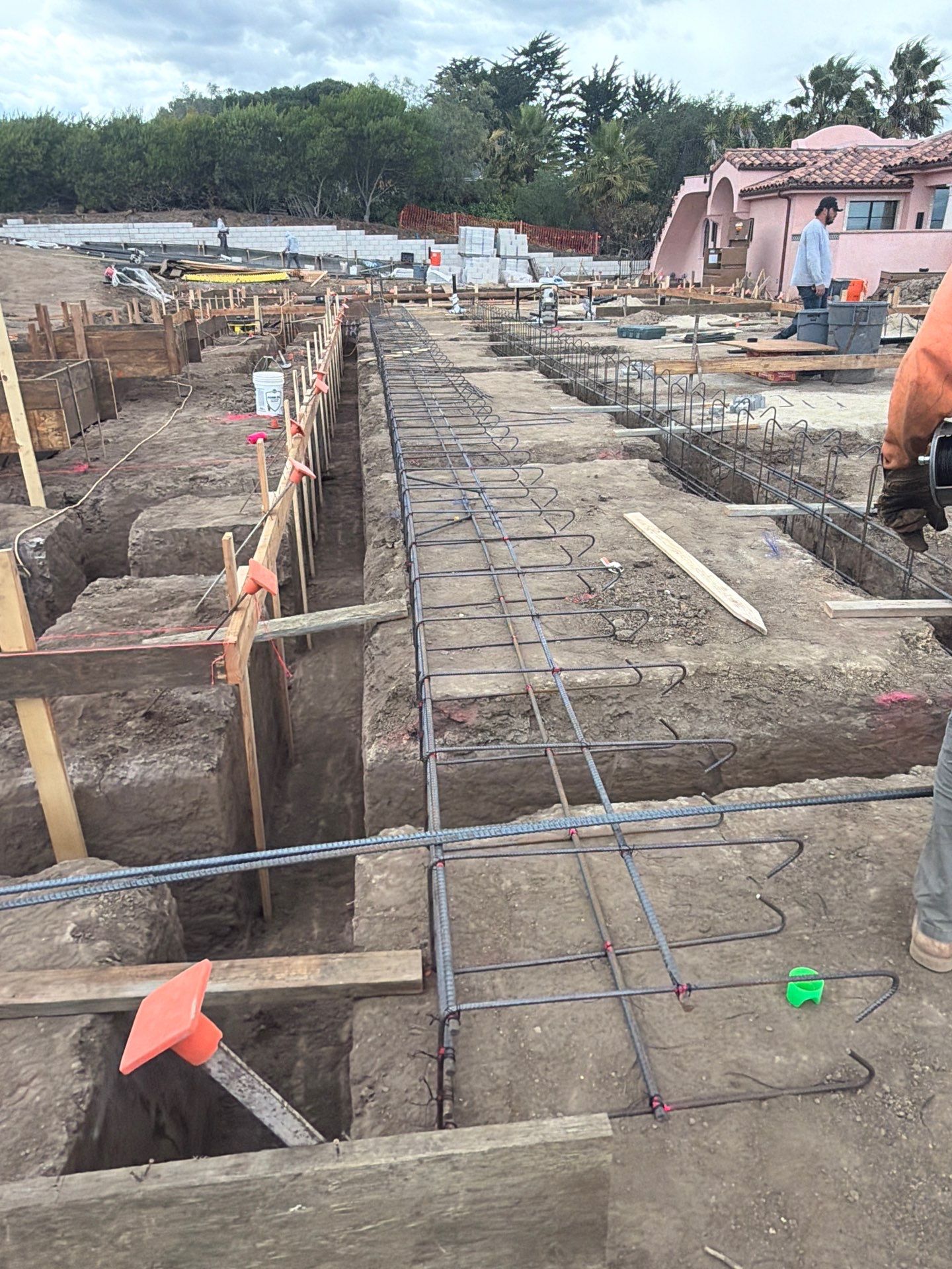The Skeleton Under the Slab: Grade Beams and Footings