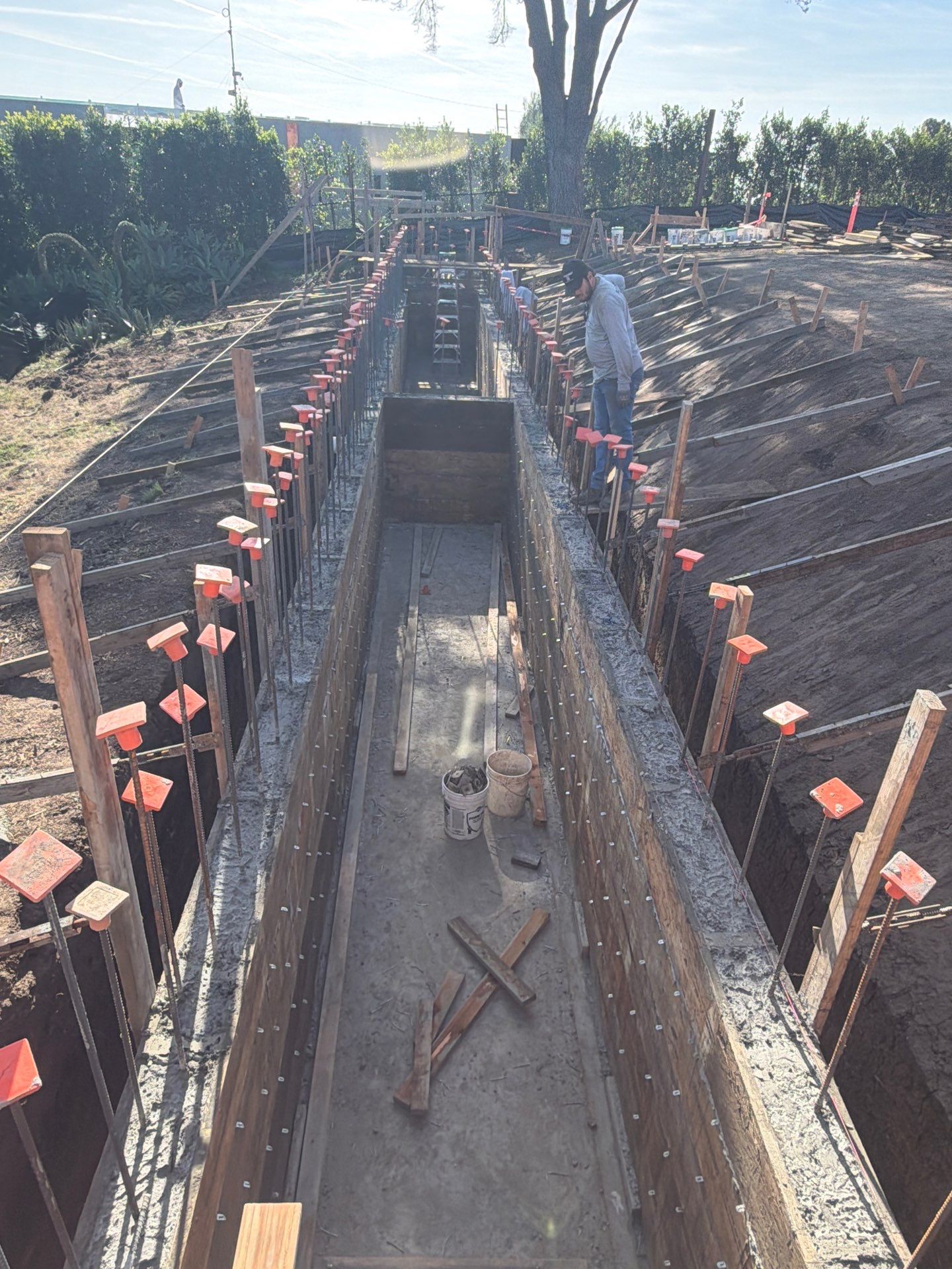 Forms stripped and cistern interior cleaned after wall pour