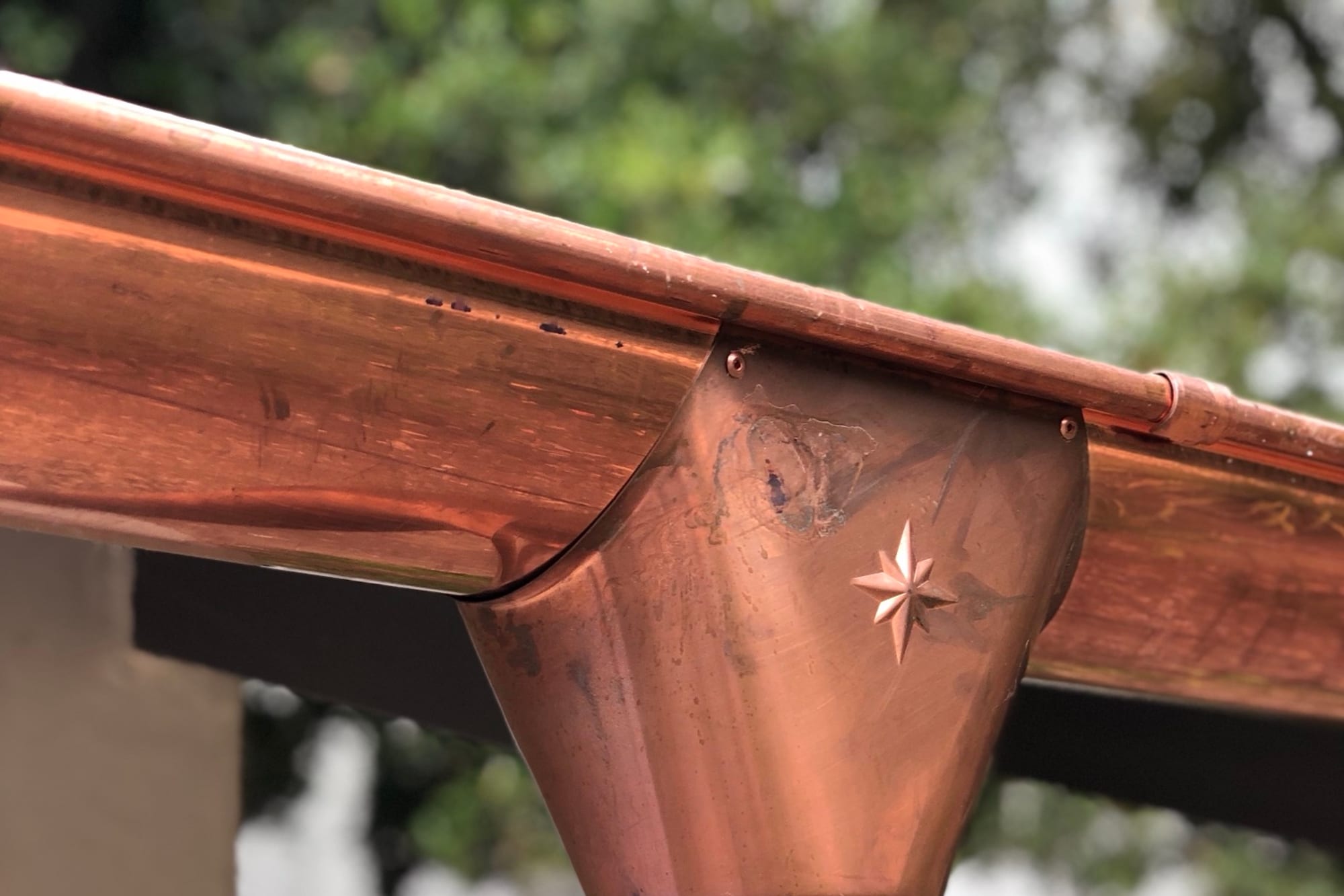 Custom copper gutters with star engraving